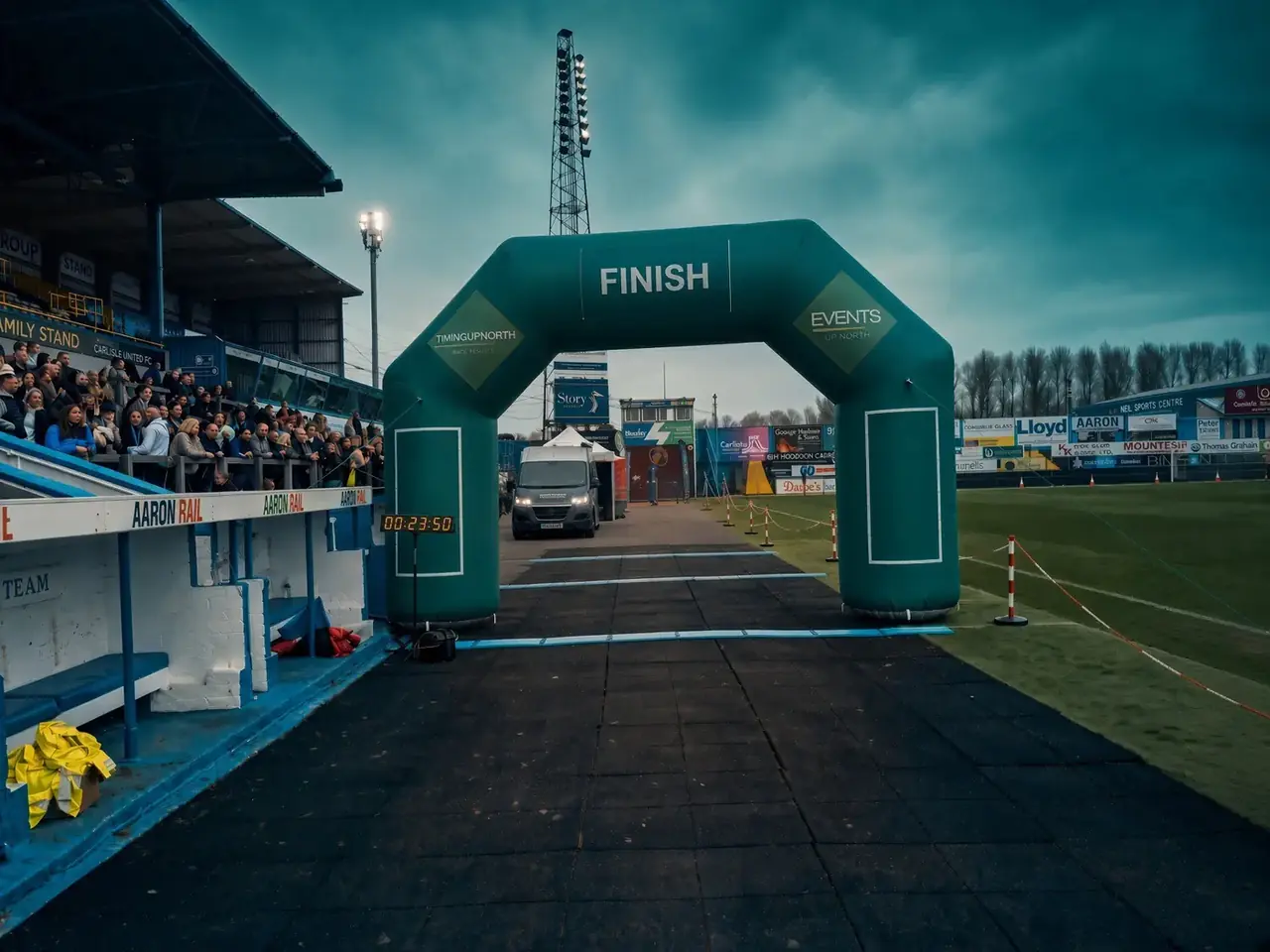 Branded inflatable finish arch at a stadium