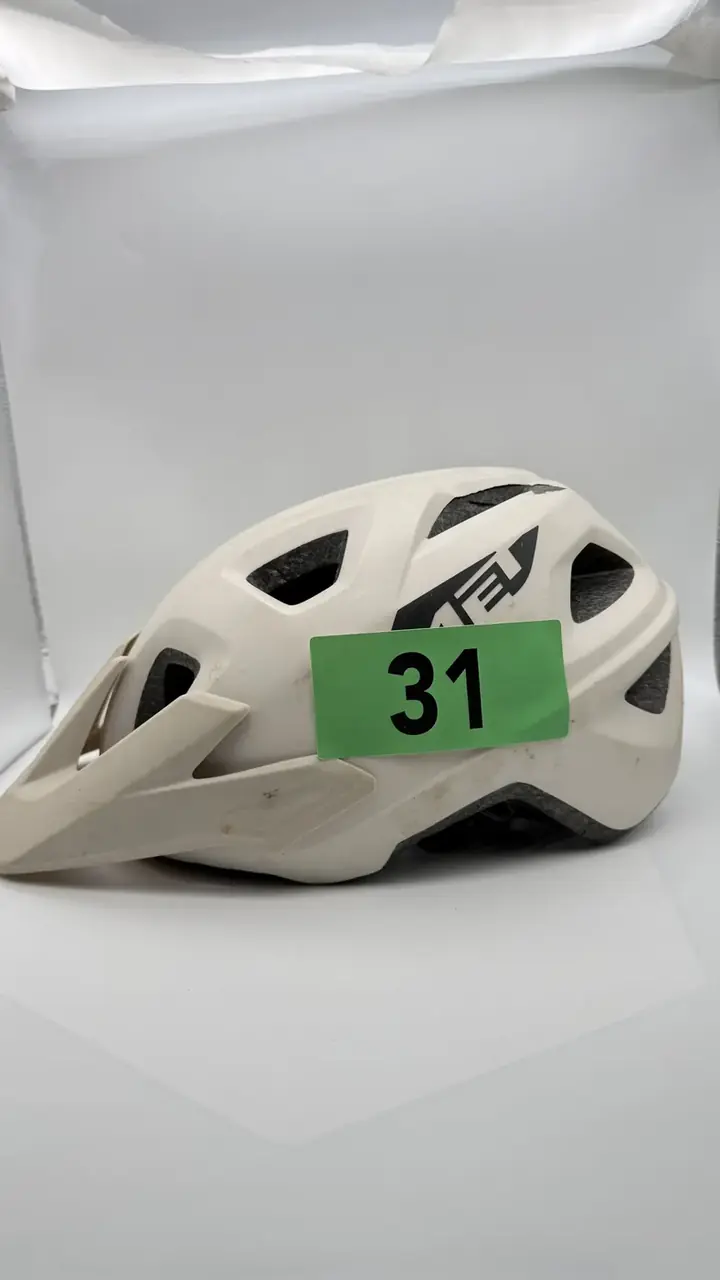 Triathlon number sticker on a cycle helmet
